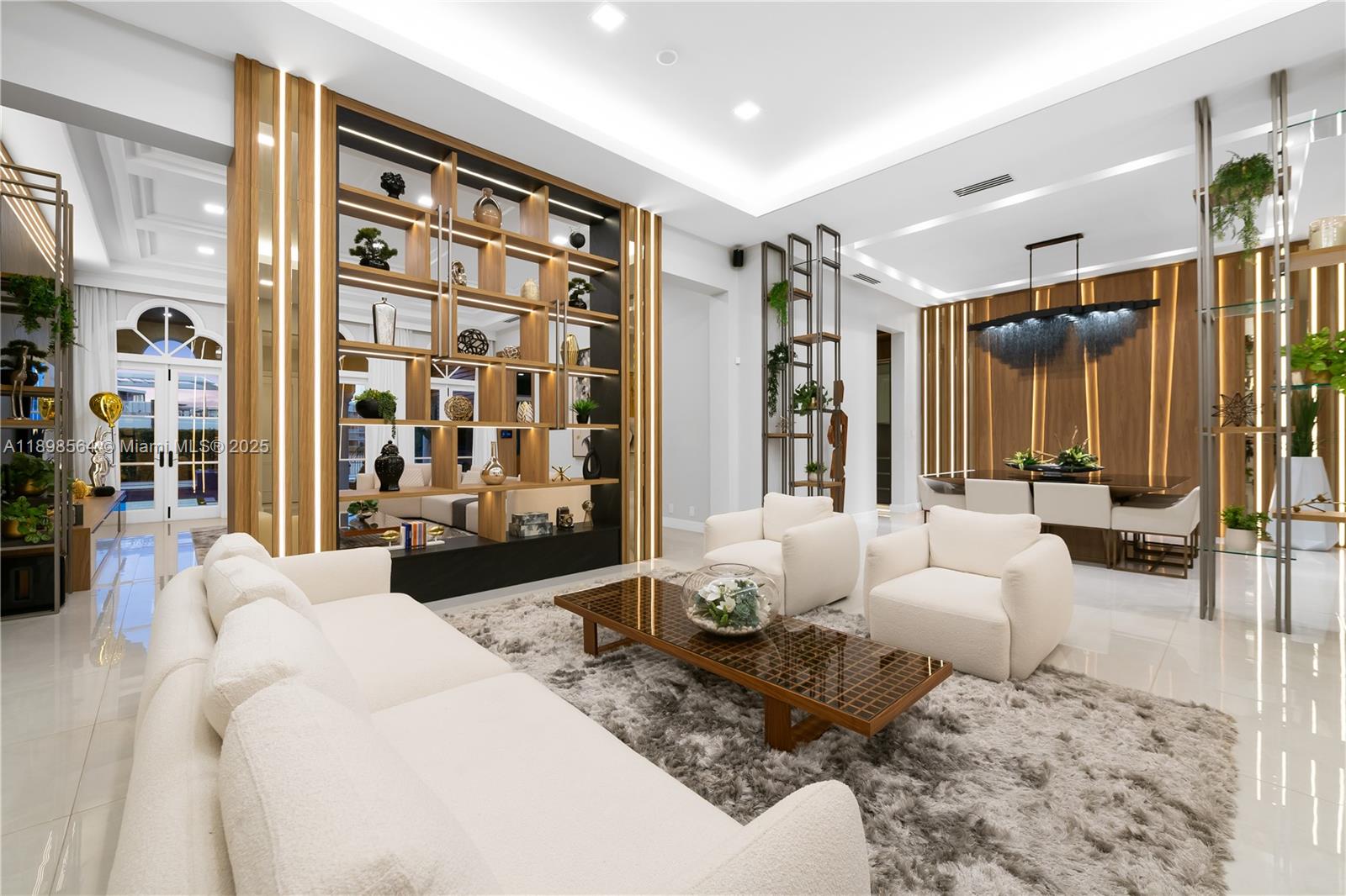 1530 Island Boulevard Aventura, FL 33160 - Photo 12 of 99 a spacious bedroom with a large bed couch and a window