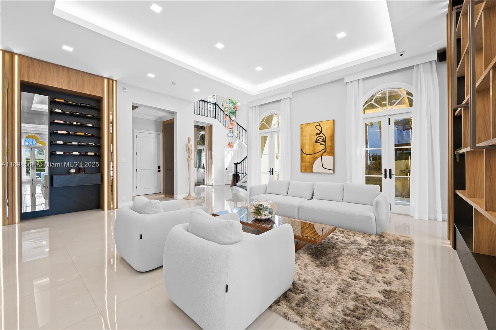 1530 Island Boulevard Aventura, FL 33160 - Photo 14 of 99 a living room with furniture a rug and white walls