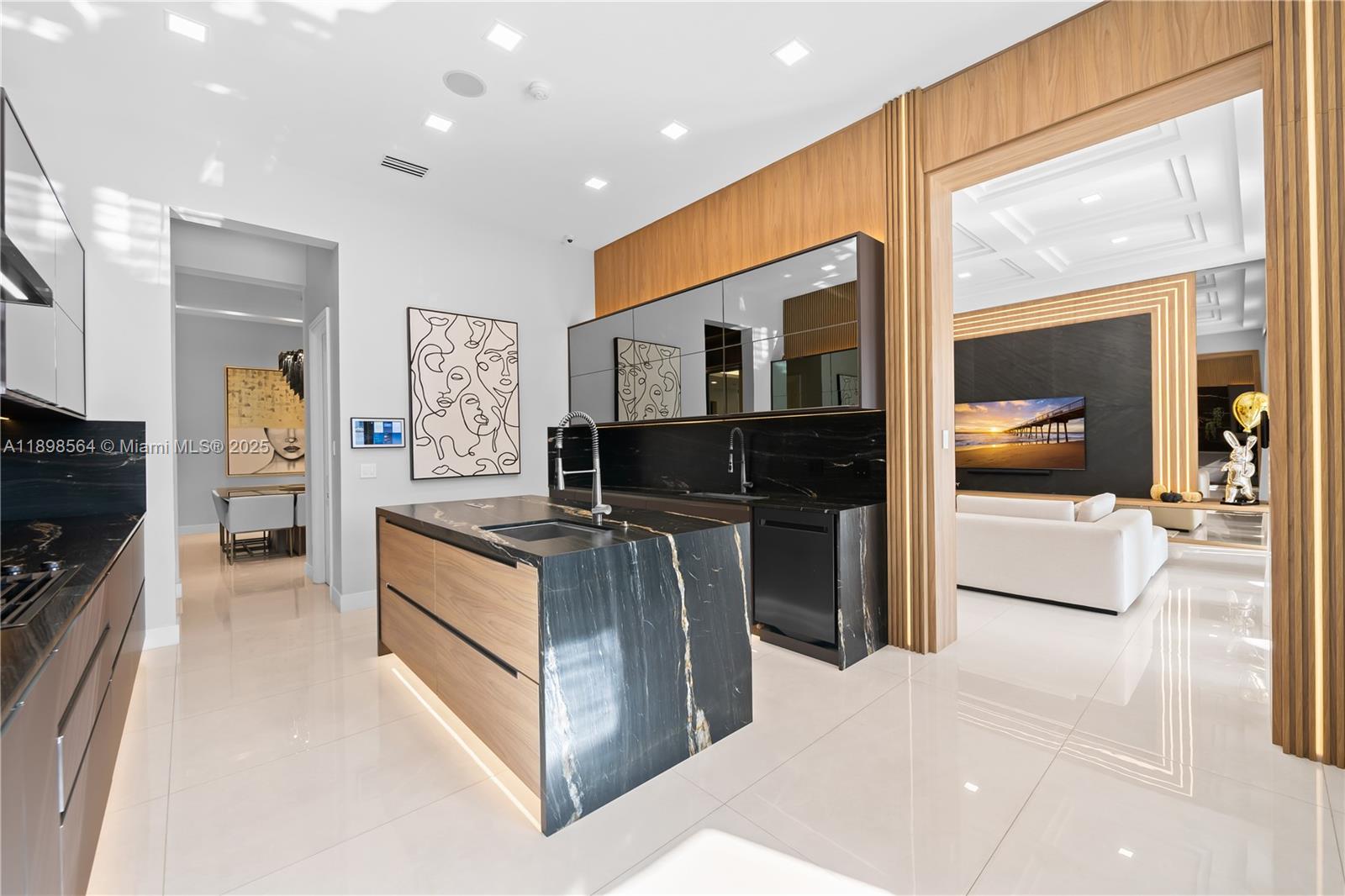 1530 Island Boulevard Aventura, FL 33160 - Photo 17 of 99 a kitchen with stainless steel appliances granite countertop a stove and a refrigerator