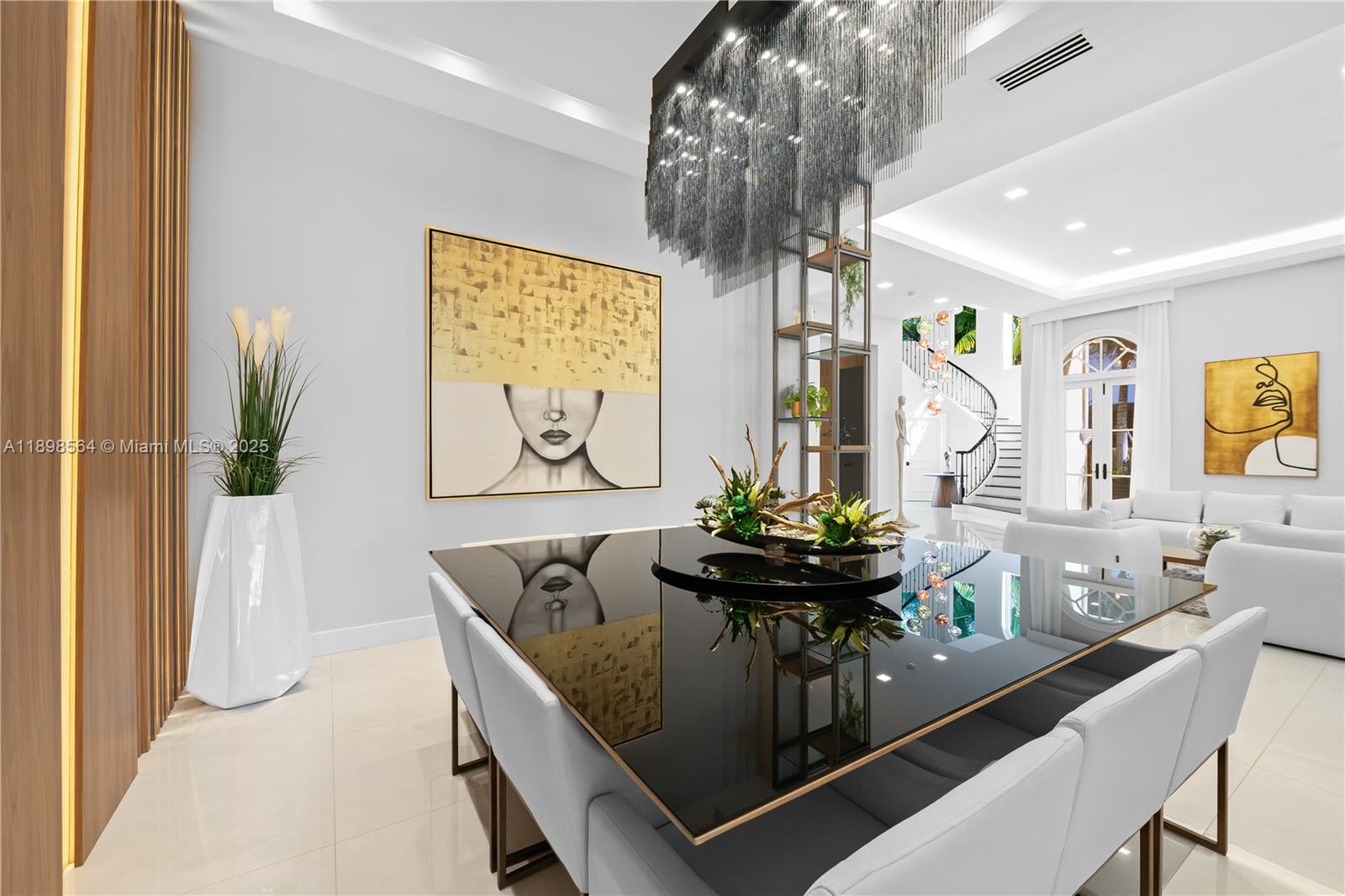 1530 Island Boulevard Aventura, FL 33160 - Photo 23 of 99 a dining room with furniture and wooden floor