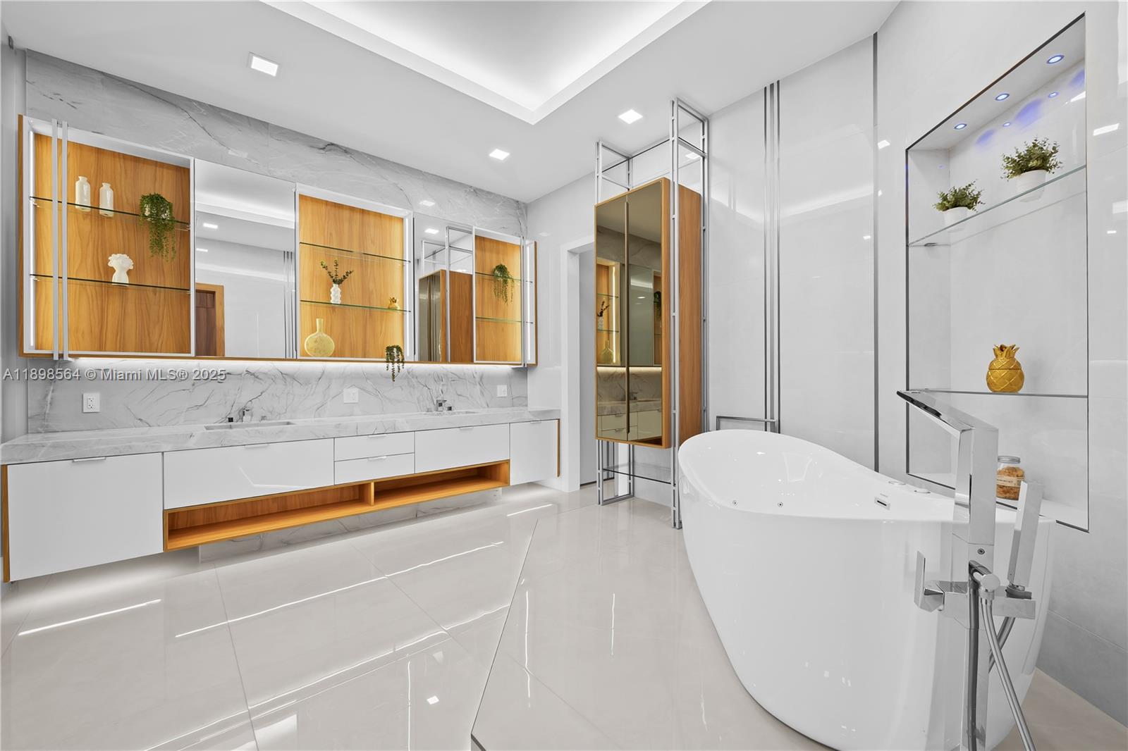 1530 Island Boulevard Aventura, FL 33160 - Photo 41 of 99 a bathroom with a sink a toilet and shower