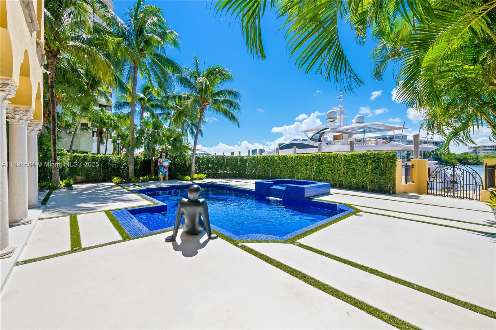1530 Island Boulevard Aventura, FL 33160 - Photo 71 of 99 a view of backyard with swimming pool and outdoor seating