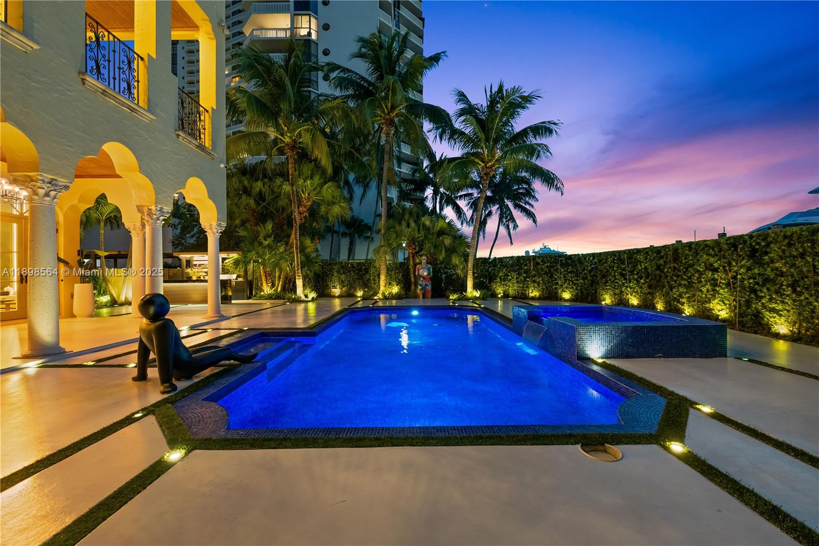 1530 Island Boulevard Aventura, FL 33160 - Photo 72 of 99 a view of swimming pool with outdoor seating and trees in the background