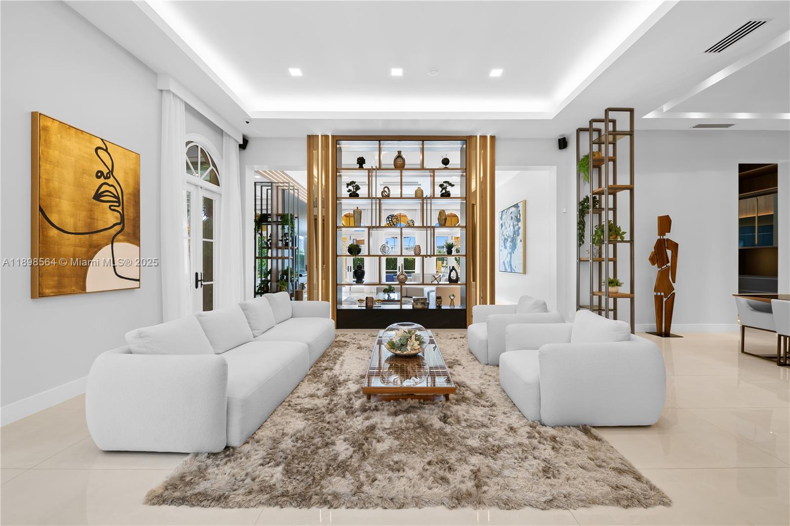 1530 Island Boulevard Aventura, FL 33160 - Photo 9 of 99 a living room with furniture and a large window