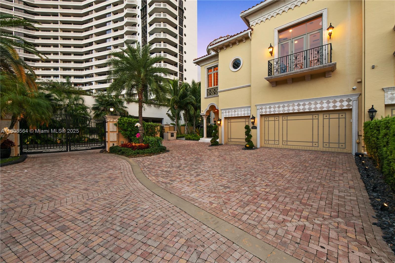 1530 Island Boulevard Aventura, FL 33160 - Photo 93 of 99 a view of a street with cars parked in front of it