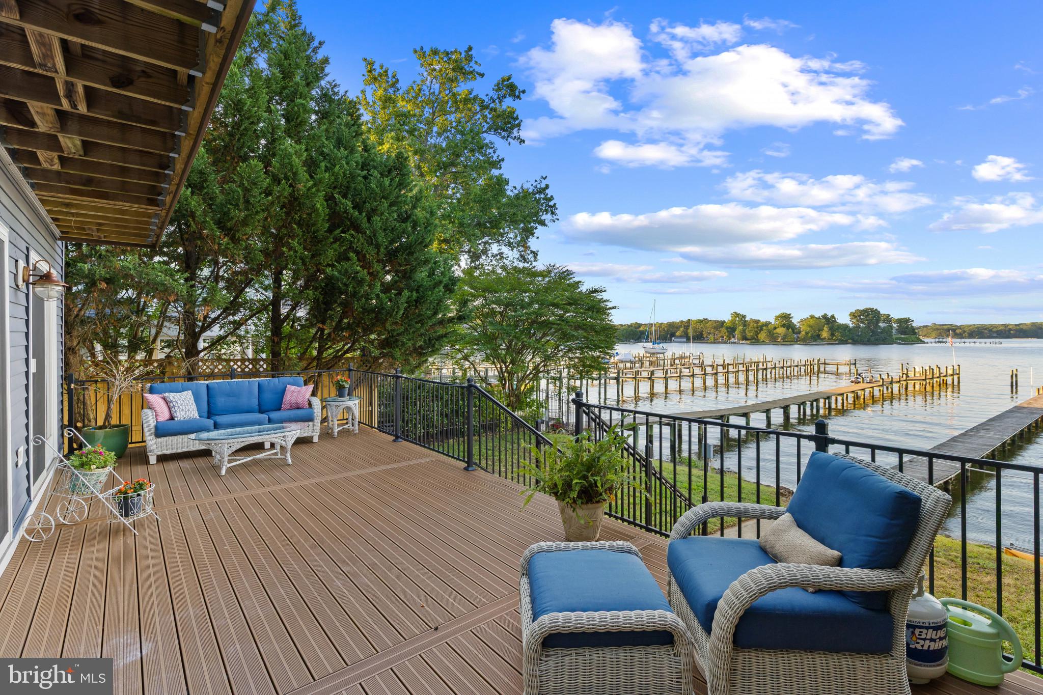 310 Magothy Road Severna Park, MD 21146 - Photo 23 of 38 a balcony with wooden floor and outdoor seating