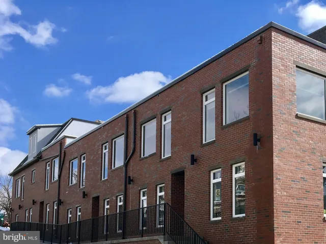 a front view of a house with balcony