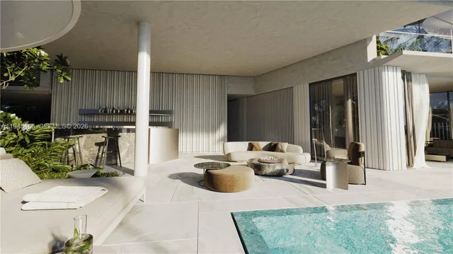 a building outdoor space with patio furniture and potted plants