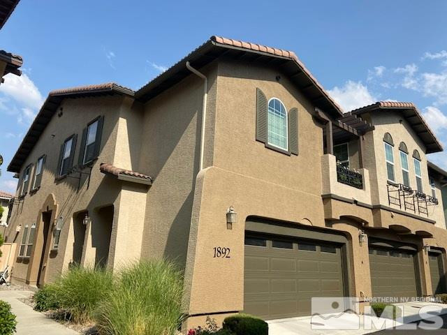 1892 Wind Ranch Road, Unit A Reno, NV 89521 - Photo 1 of 1 a front view of a house
