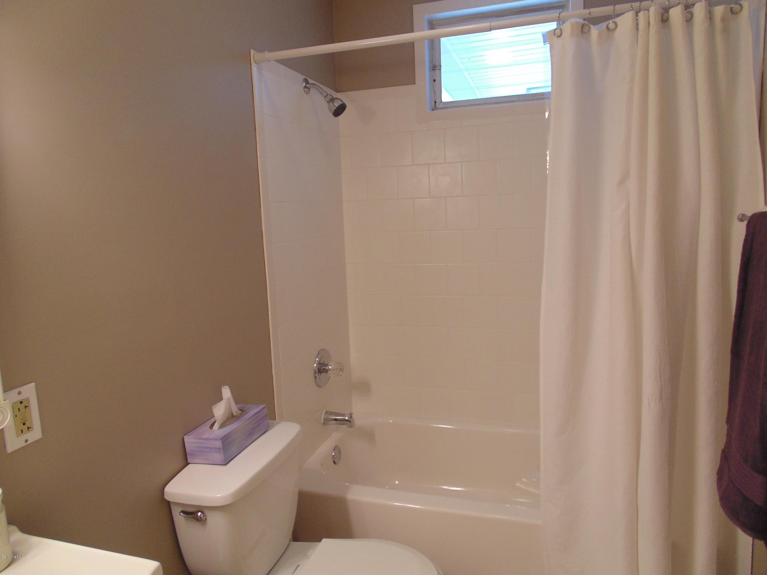 1273 South Washington State Road Washington, MA 01223 - Photo 14 of 22 a bathroom with a toilet and a bathtub