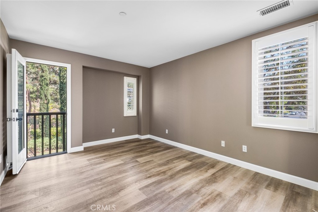 61 Bellwind Irvine, CA 92603 - Photo 13 of 22 a view of an empty room with a window