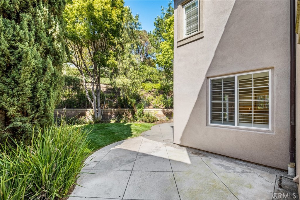 61 Bellwind Irvine, CA 92603 - Photo 17 of 22 a view of a house with a backyard