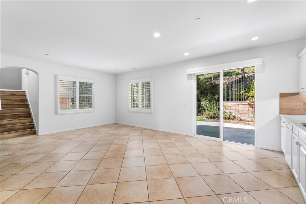 61 Bellwind Irvine, CA 92603 - Photo 6 of 22 a view of an empty room with a window