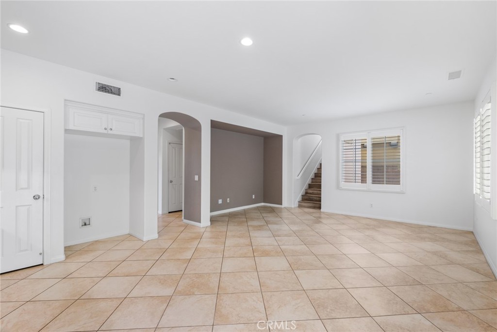 61 Bellwind Irvine, CA 92603 - Photo 7 of 22 a view of empty room with windows