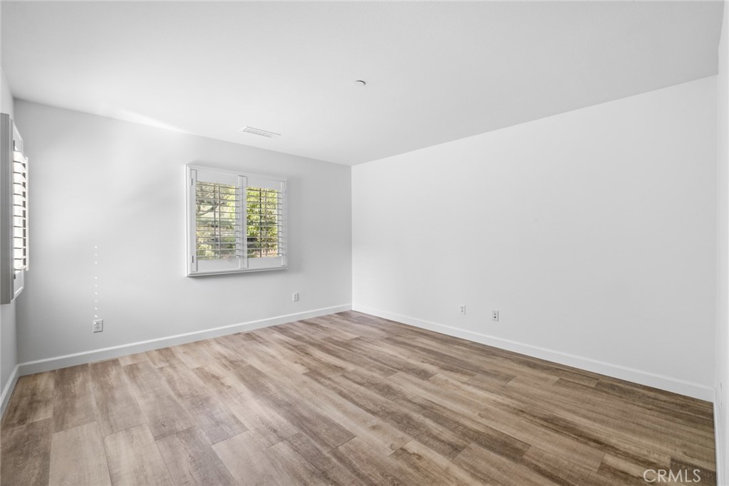 61 Bellwind Irvine, CA 92603 - Photo 10 of 22 an empty room with a window