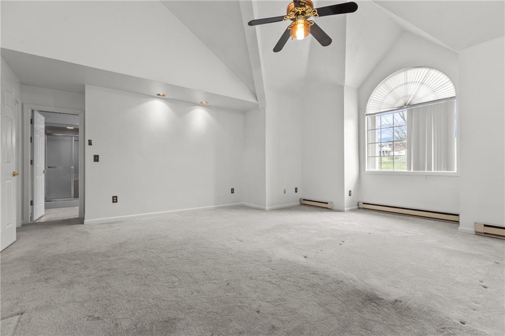 9260 Lakeview Drive Irwin, PA 15642 - Photo 24 of 47 an empty room with windows and fan