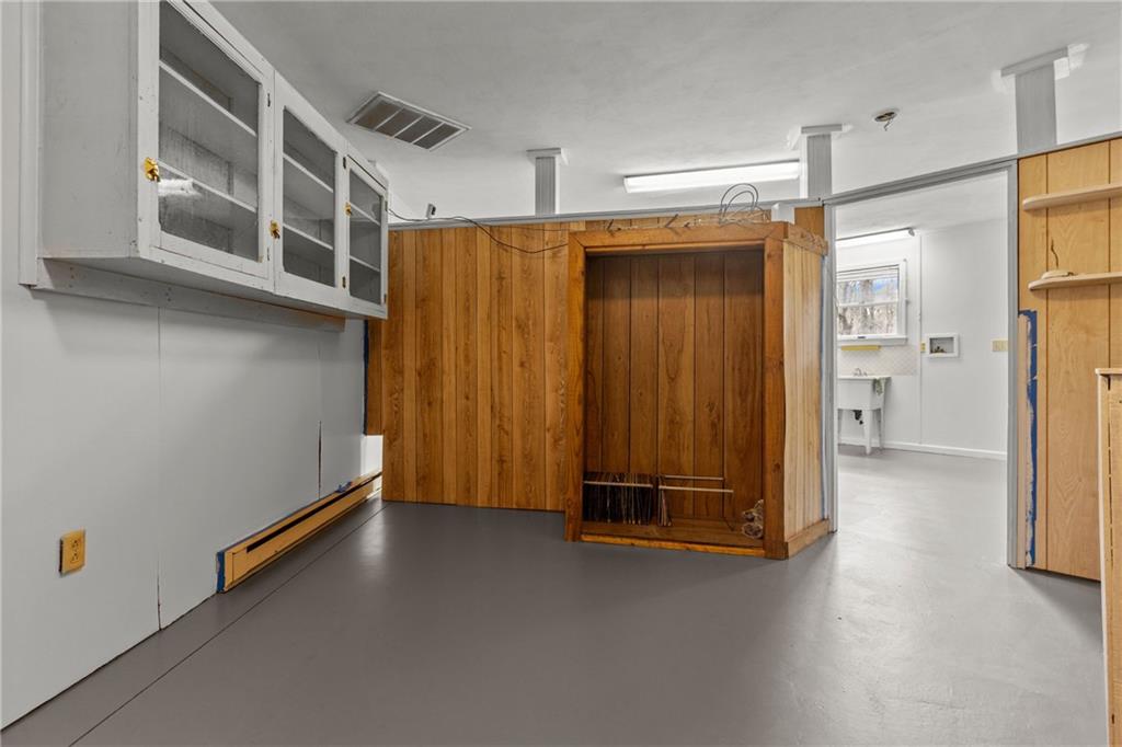 9260 Lakeview Drive Irwin, PA 15642 - Photo 31 of 47 a view of entryway with wooden walls