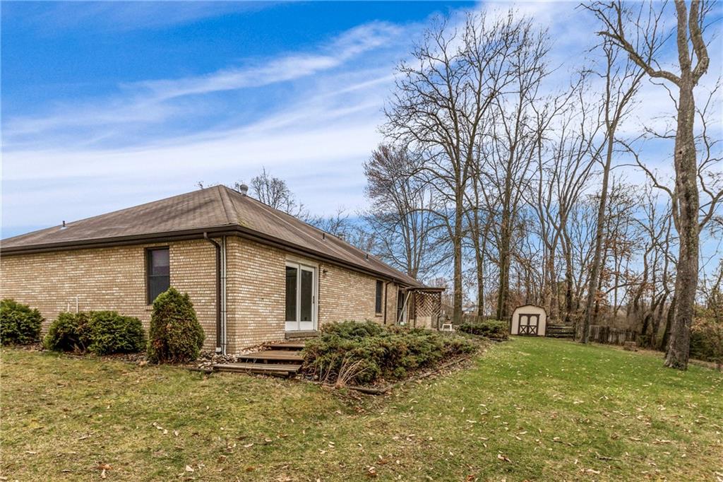 9260 Lakeview Drive Irwin, PA 15642 - Photo 33 of 47 a front view of a house with garden