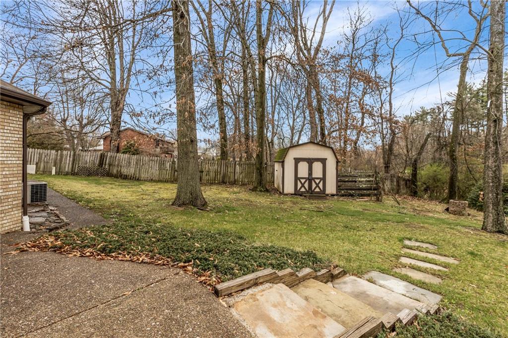 9260 Lakeview Drive Irwin, PA 15642 - Photo 36 of 47 a backyard of a house with table and chairs