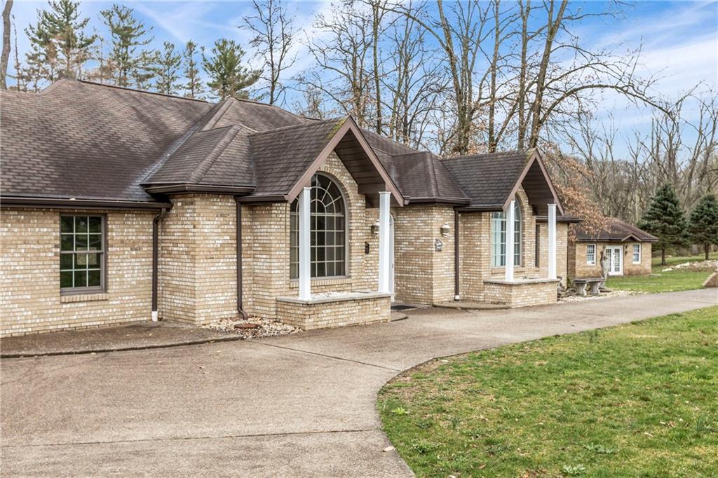 9260 Lakeview Drive Irwin, PA 15642 - Photo 39 of 47 front view of a house with a outdoor space