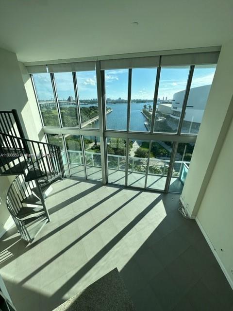 Downtown Miami Miami, FL 33132 - Photo 4 of 17 a view of deck with furniture and floor to ceiling window