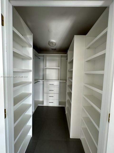 Downtown Miami Miami, FL 33132 - Photo 7 of 17 a view of walk in closet with empty racks