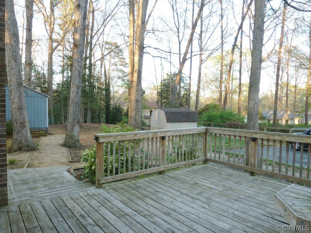 10424 Melissa Mill Road Chesterfield, VA 23236 - Photo 17 of 23 a view of a deck with mountain view and wooden floor