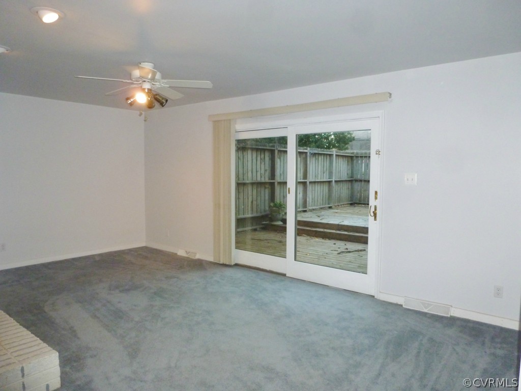 10424 Melissa Mill Road Chesterfield, VA 23236 - Photo 9 of 23 an empty room with a empty space and a ceiling fan