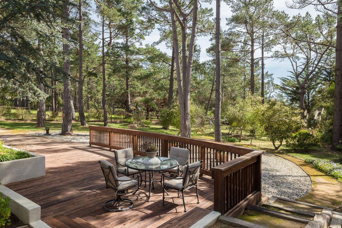 3978 Ronda Road Pebble Beach, CA 93953 - Photo 18 of 20 a view of backyard with seating and trees