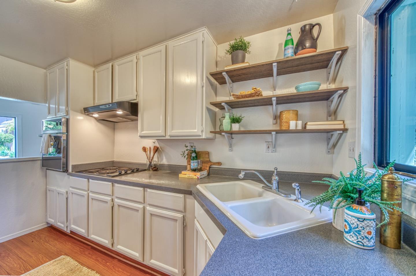 421 Park Drive Aptos, CA 95003 - Photo 15 of 34 a kitchen with stainless steel appliances a sink a stove and cabinets