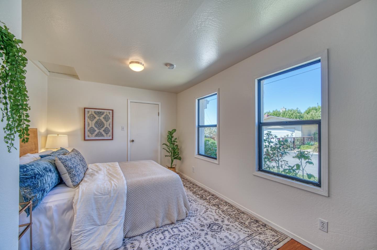 421 Park Drive Aptos, CA 95003 - Photo 17 of 34 a bedroom with a large bed and a window