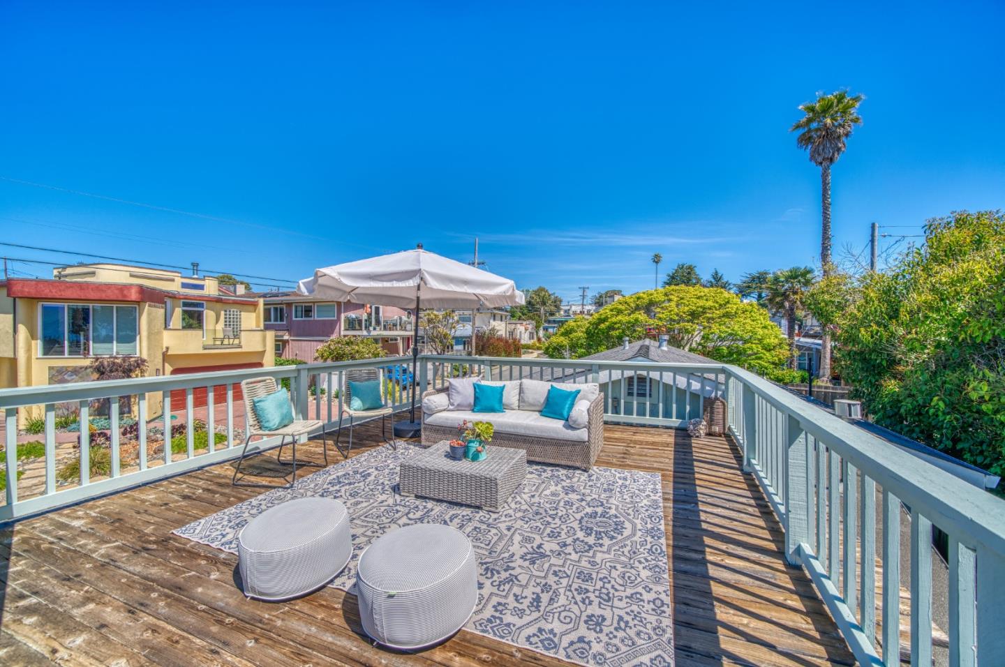 421 Park Drive Aptos, CA 95003 - Photo 31 of 34 a balcony with wooden floor table and chairs