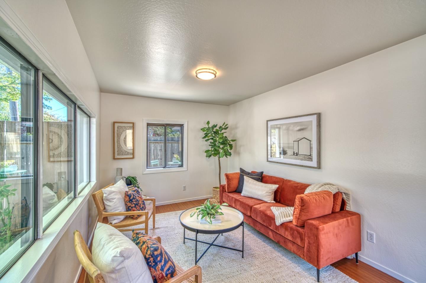 421 Park Drive Aptos, CA 95003 - Photo 10 of 34 a living room with furniture and a potted plant