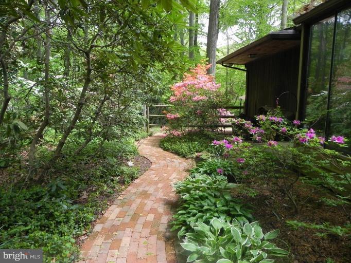 1111 Fox Den Road Bel Air, MD 21014 - Photo 19 of 30 Walking path around side to fenced rear yard.