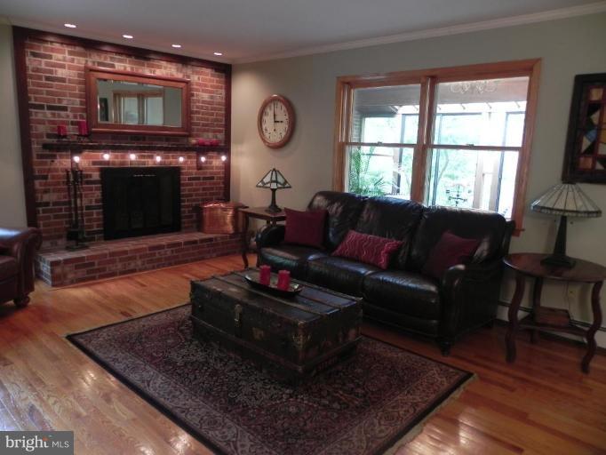 1111 Fox Den Road Bel Air, MD 21014 - Photo 3 of 30 Relax by the wood-burning fireplace.