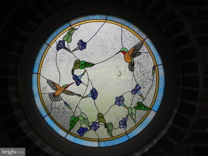 1111 Fox Den Road Bel Air, MD 21014 - Photo 5 of 30 Beautiful stained glass window in the sunroom.