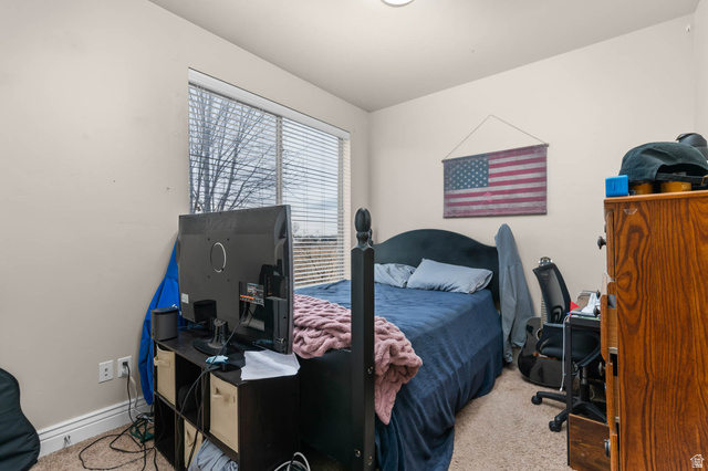 476 West 200 N Street, Unit 206 Springville, UT 84663 - Photo 14 of 24 Bedroom with a desk and light carpet