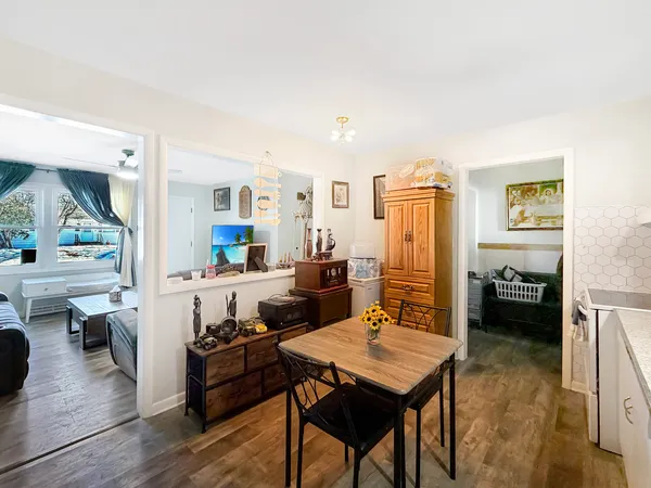 a living room with furniture and a table