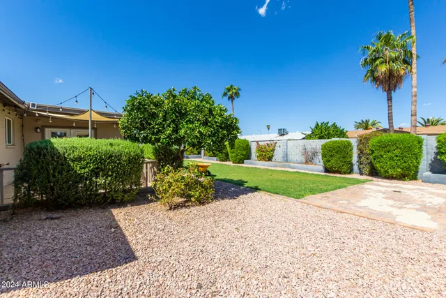 a view of a two chairs on the roof deck