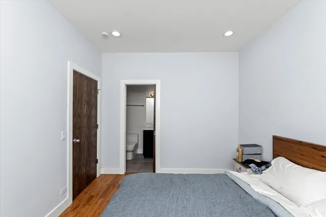 a view of a bedroom with closet