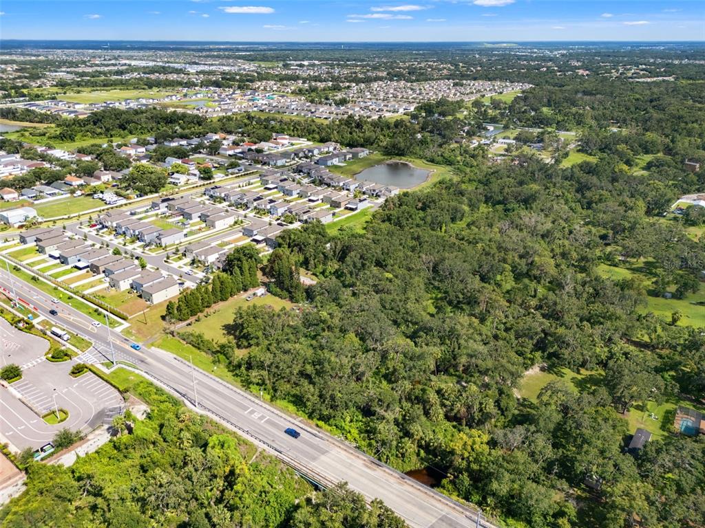 9889 Symmes Road Riverview, FL 33578 - Photo 11 of 11 a view of a green field