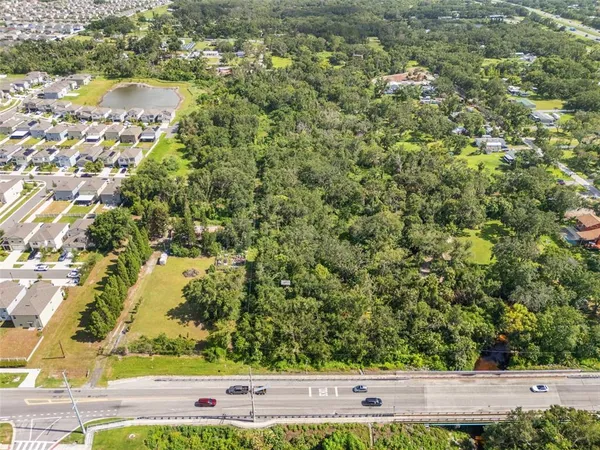 a view of a yard with an outdoor space