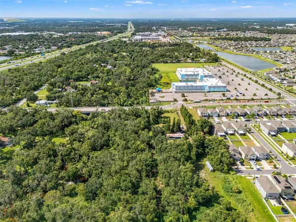 an aerial view of residential building and lake view