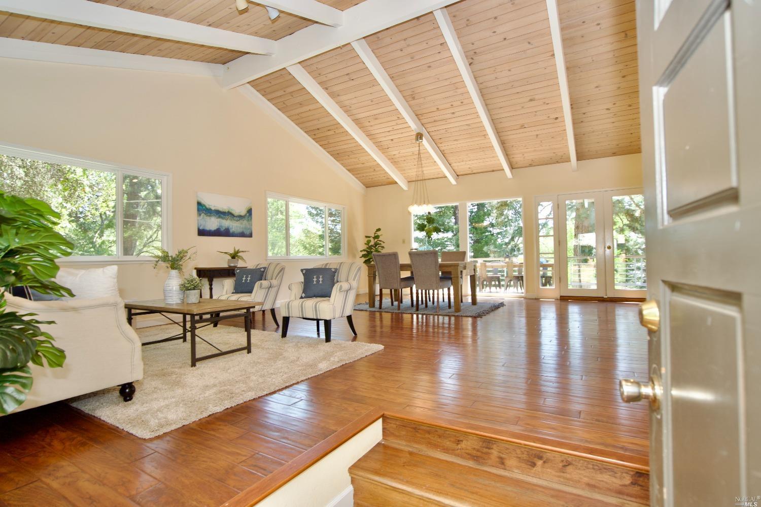 521 Viewridge Drive Angwin, CA 94508 - Photo 1 of 1 a livingroom with furniture wooden floor and a floor to ceiling window