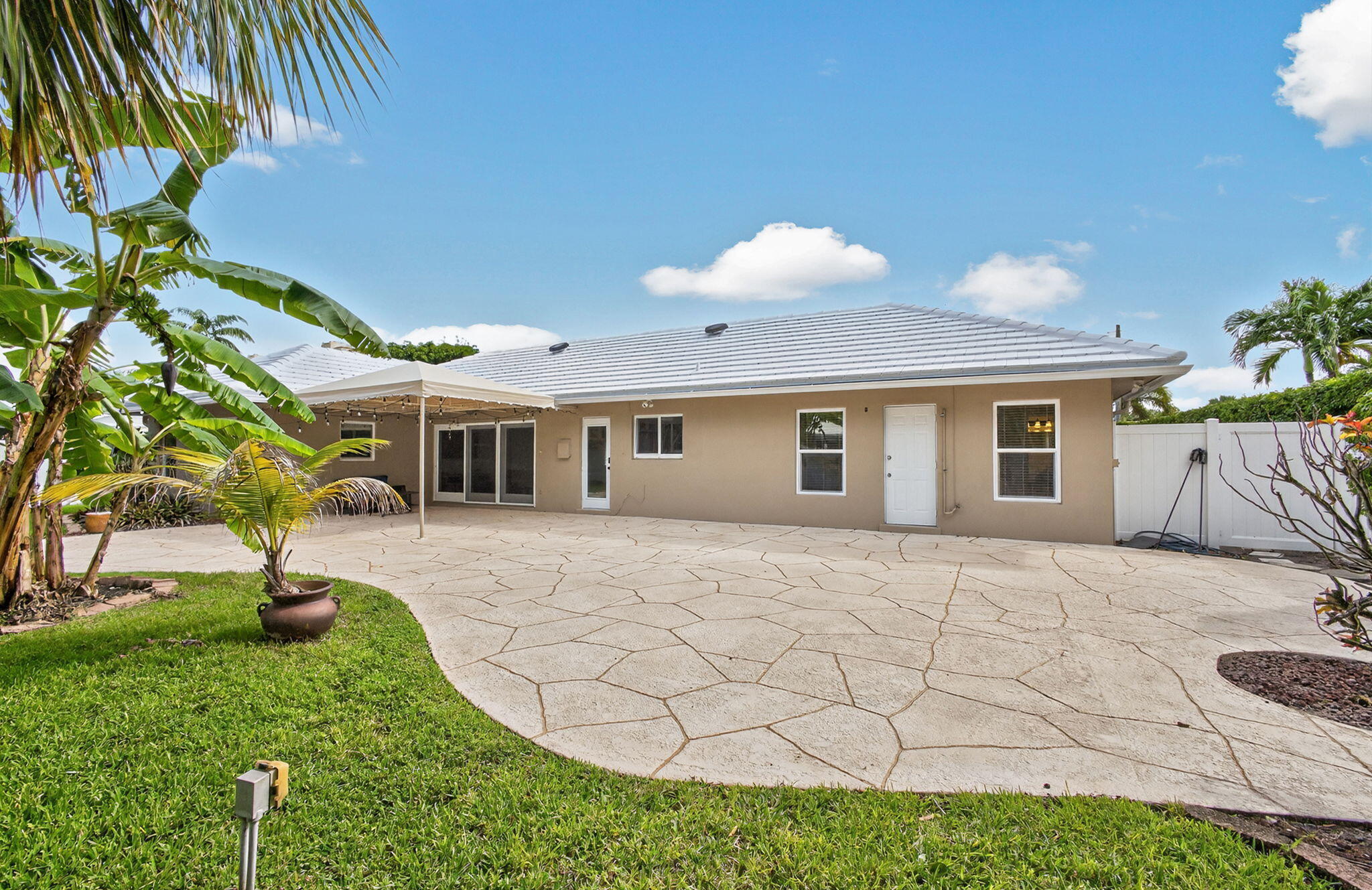 1206 Dolphin Road Singer Island, FL 33404 - Photo 56 of 65 Back yard