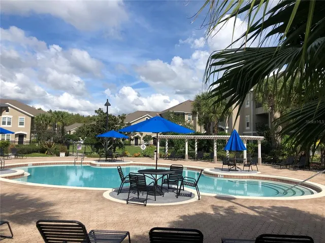 a view of outdoor space deck and swimming pool