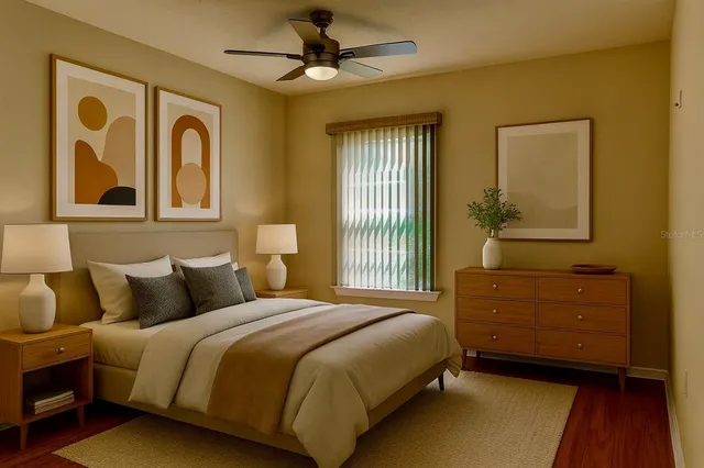 a bedroom with a bed and a window