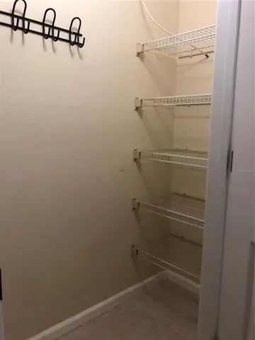 a view of a room with racks on the wall