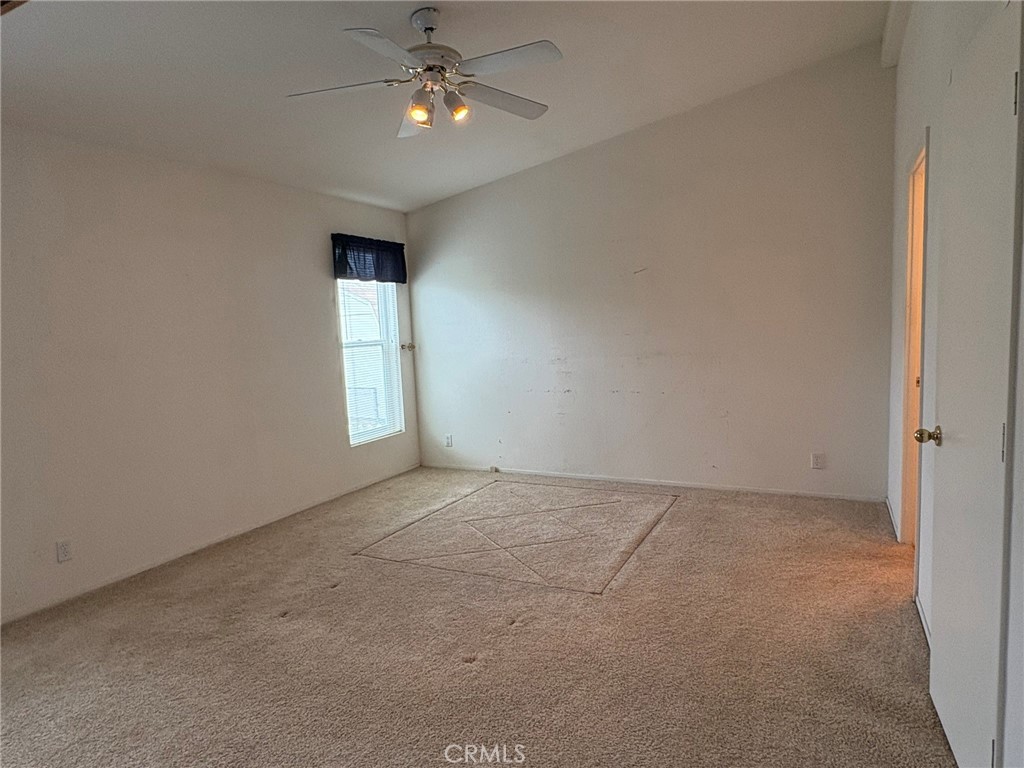 5813 Pacific Heights Road, Unit 126 Oroville, CA 95965 - Photo 20 of 59 an empty room with windows and fan