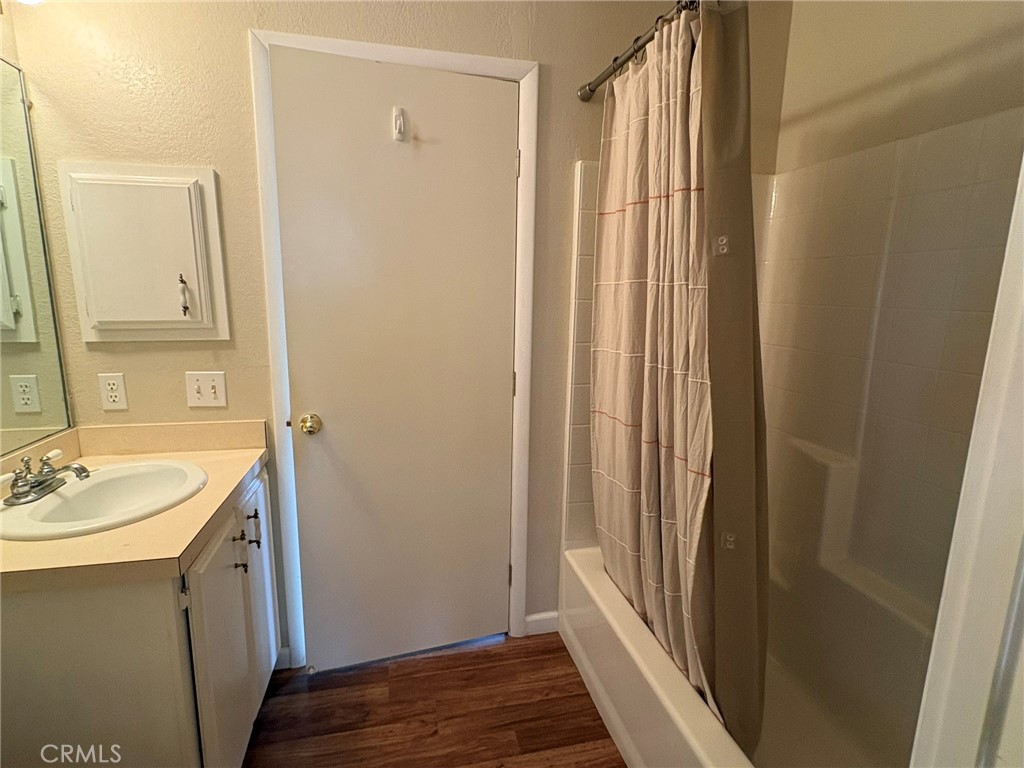 5813 Pacific Heights Road, Unit 126 Oroville, CA 95965 - Photo 32 of 59 a bathroom with a sink a mirror and a shower